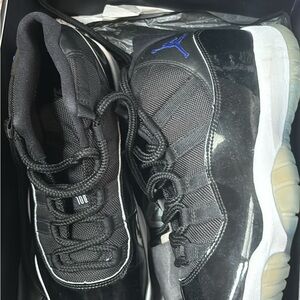 Air Jordan Retro 11 Black and Blue Sneakers